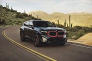 bmw xm label red driving in the desert