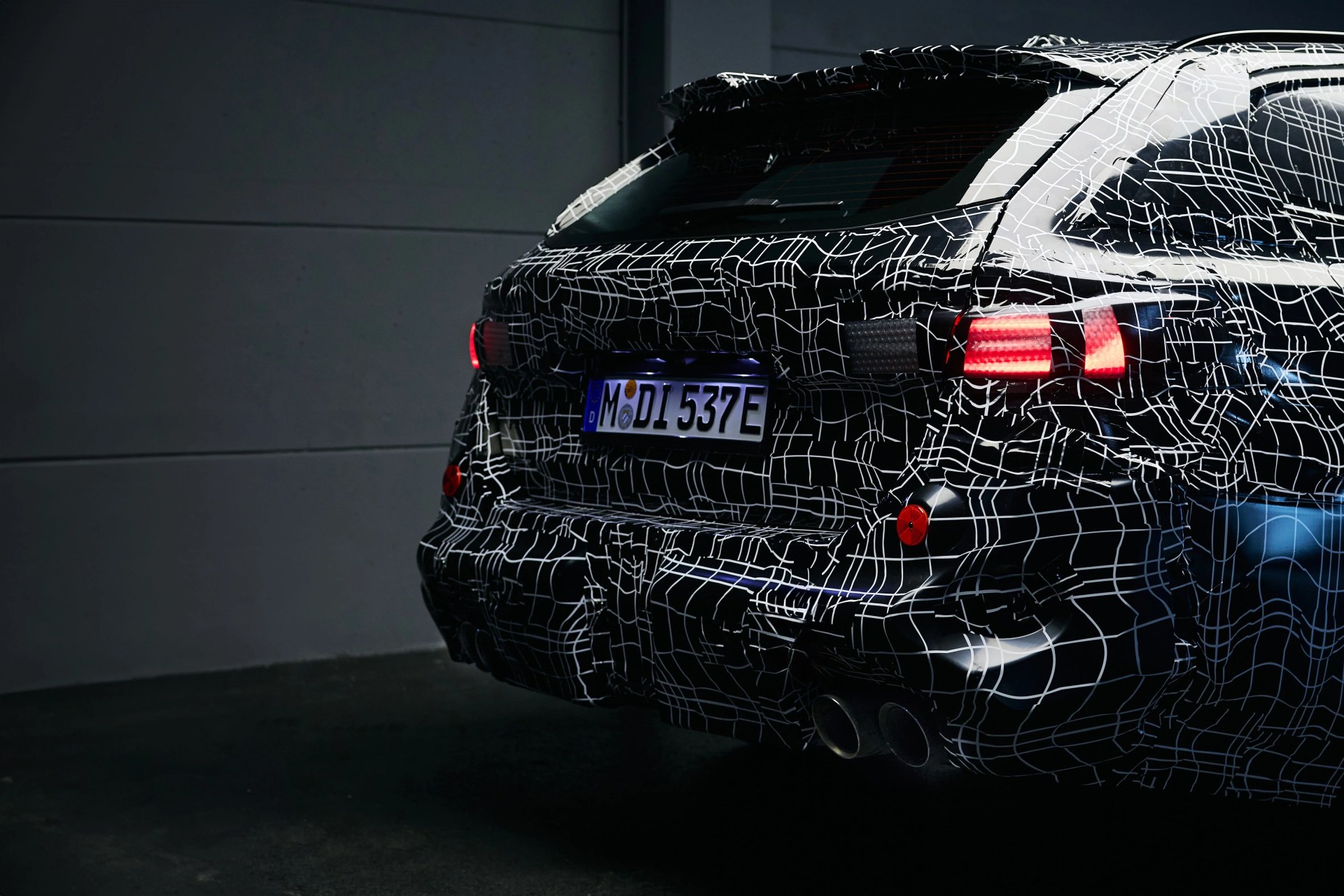 teaser if back end of new bmw m5 touring