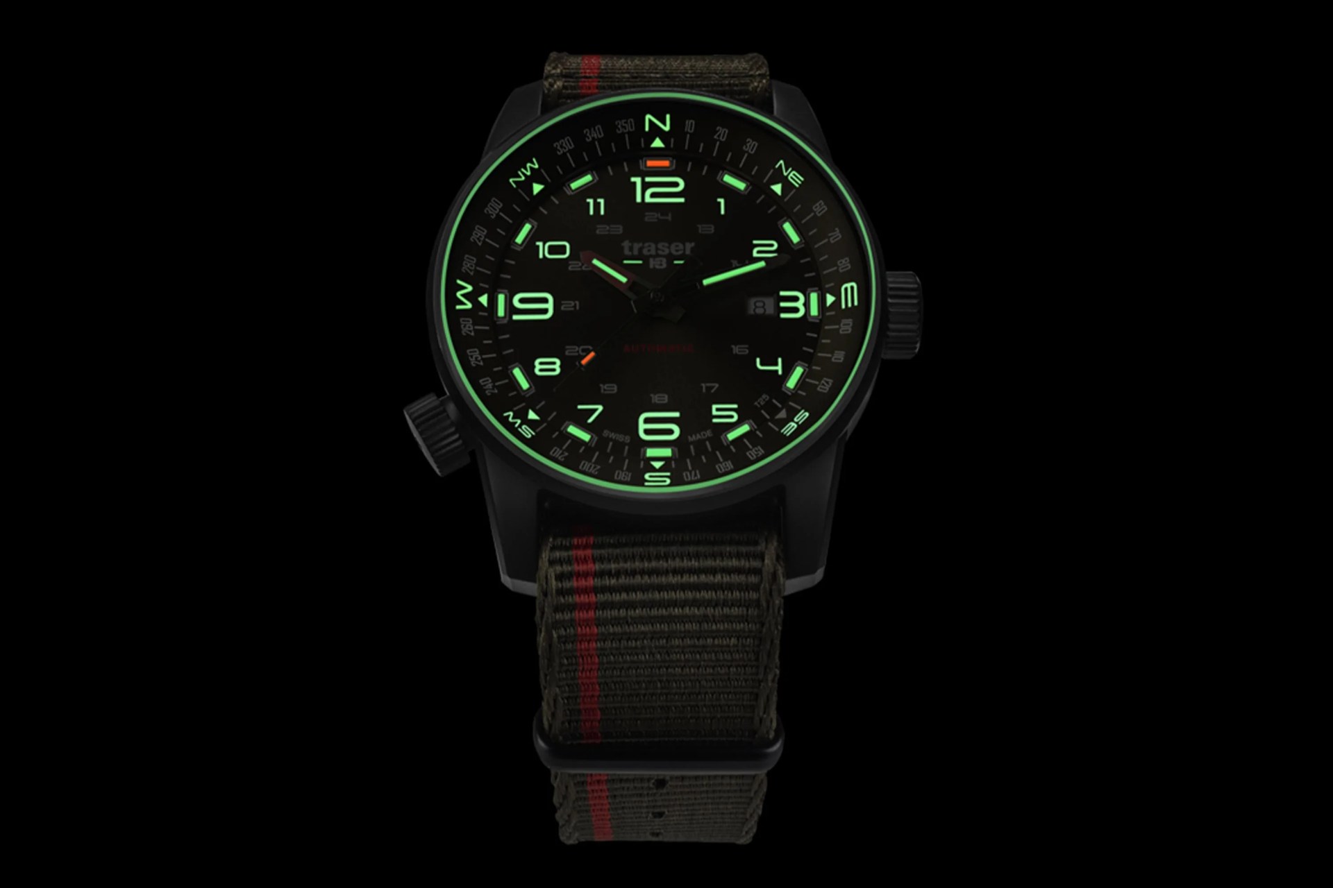 tritium watch illuminated on a black background