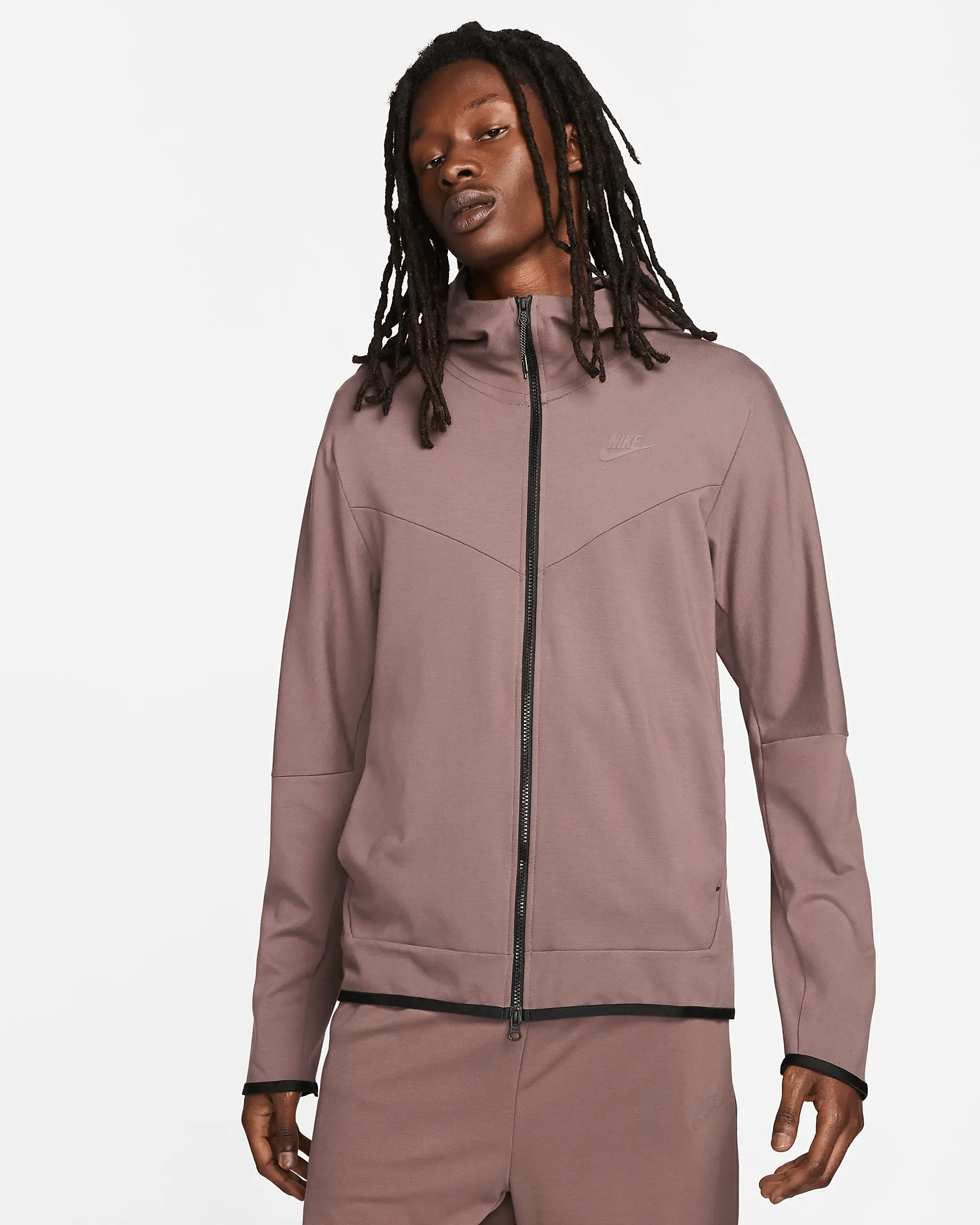 man in zip up fleece
