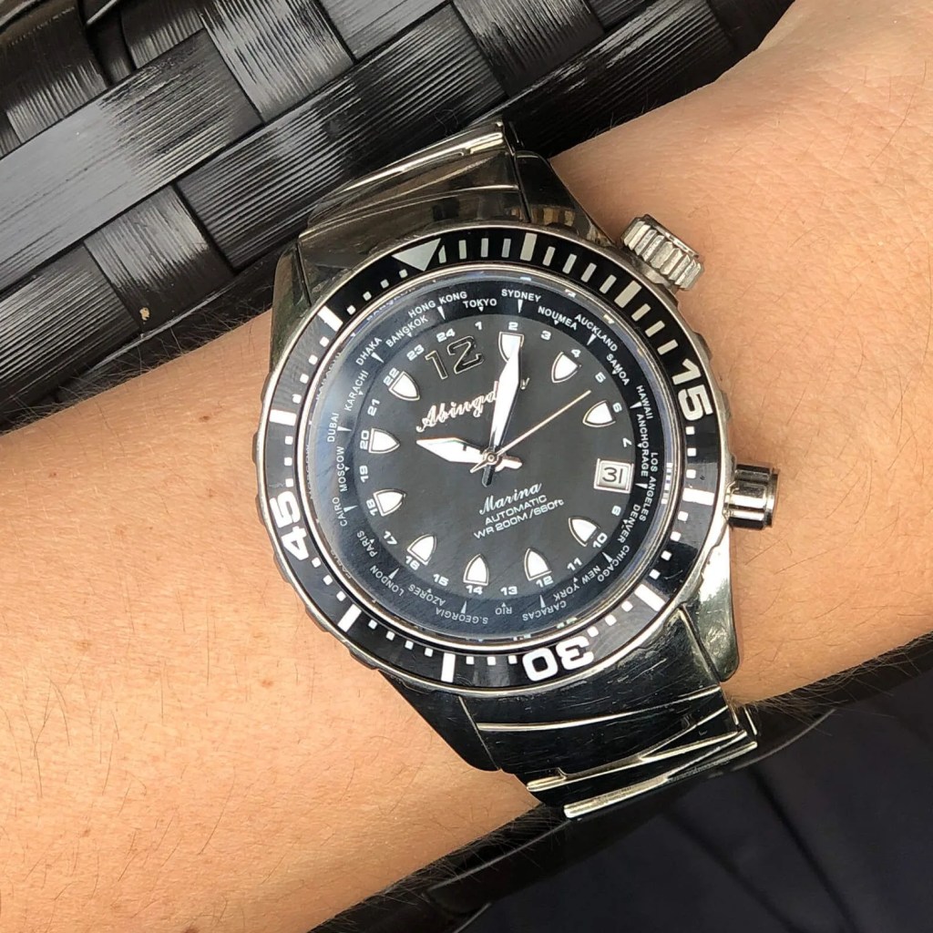 a person wearing a watch on their wrist