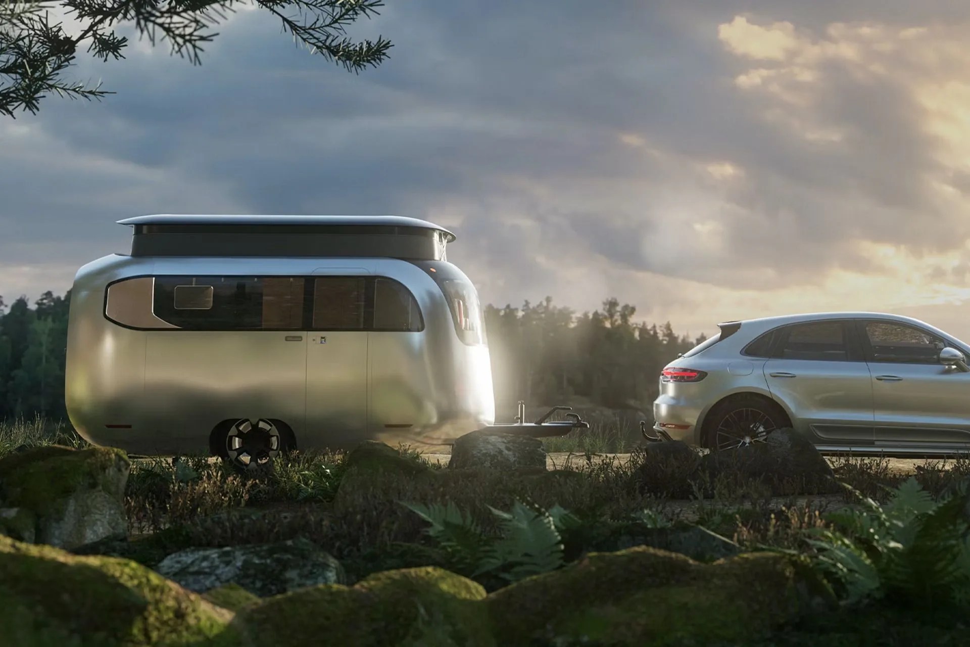 sleek airstream camping trailer in nature