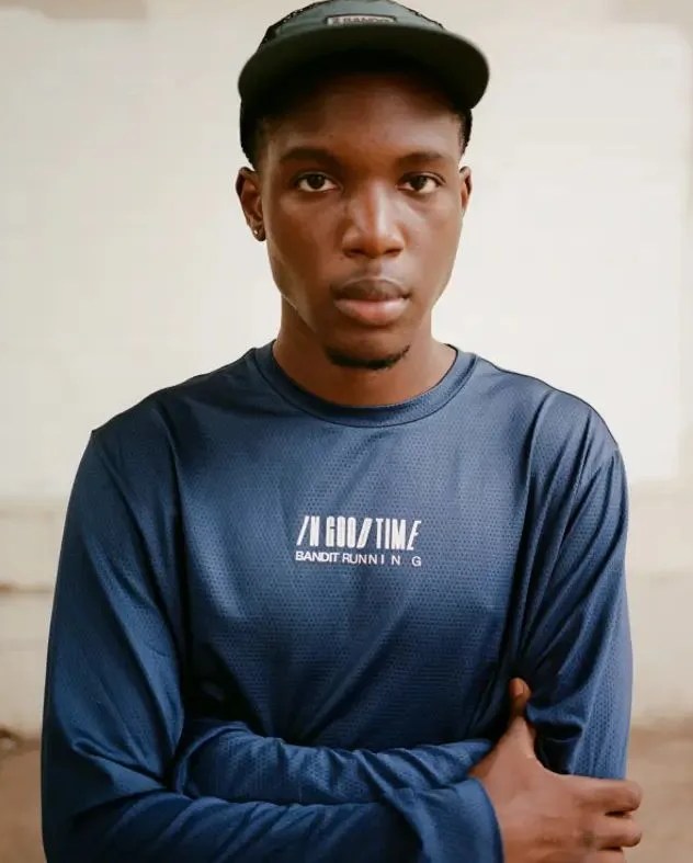 a man wearing bandit running fall 2023 blue long sleeve