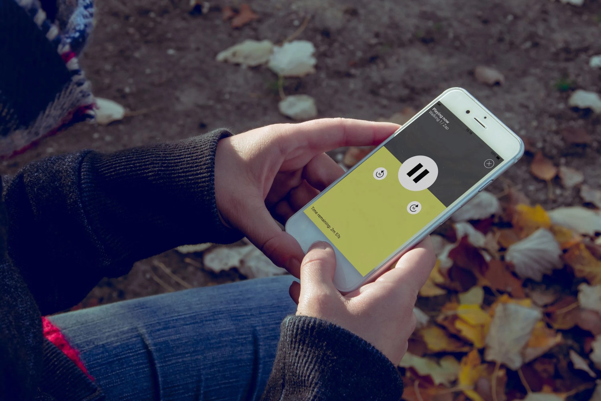 a person using a meditation app outside