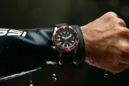 citizen dive watch on wet wrist wearing a wetsuit