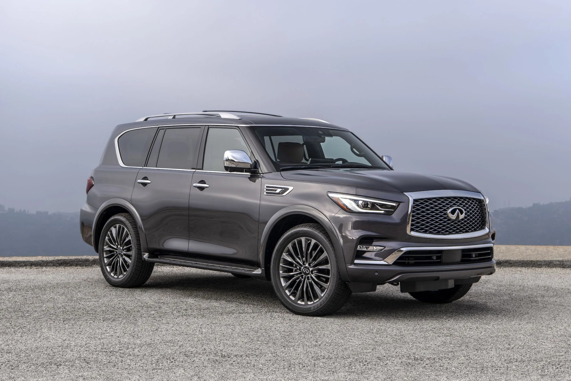 infiniti qx80 with a cloudy backdrop