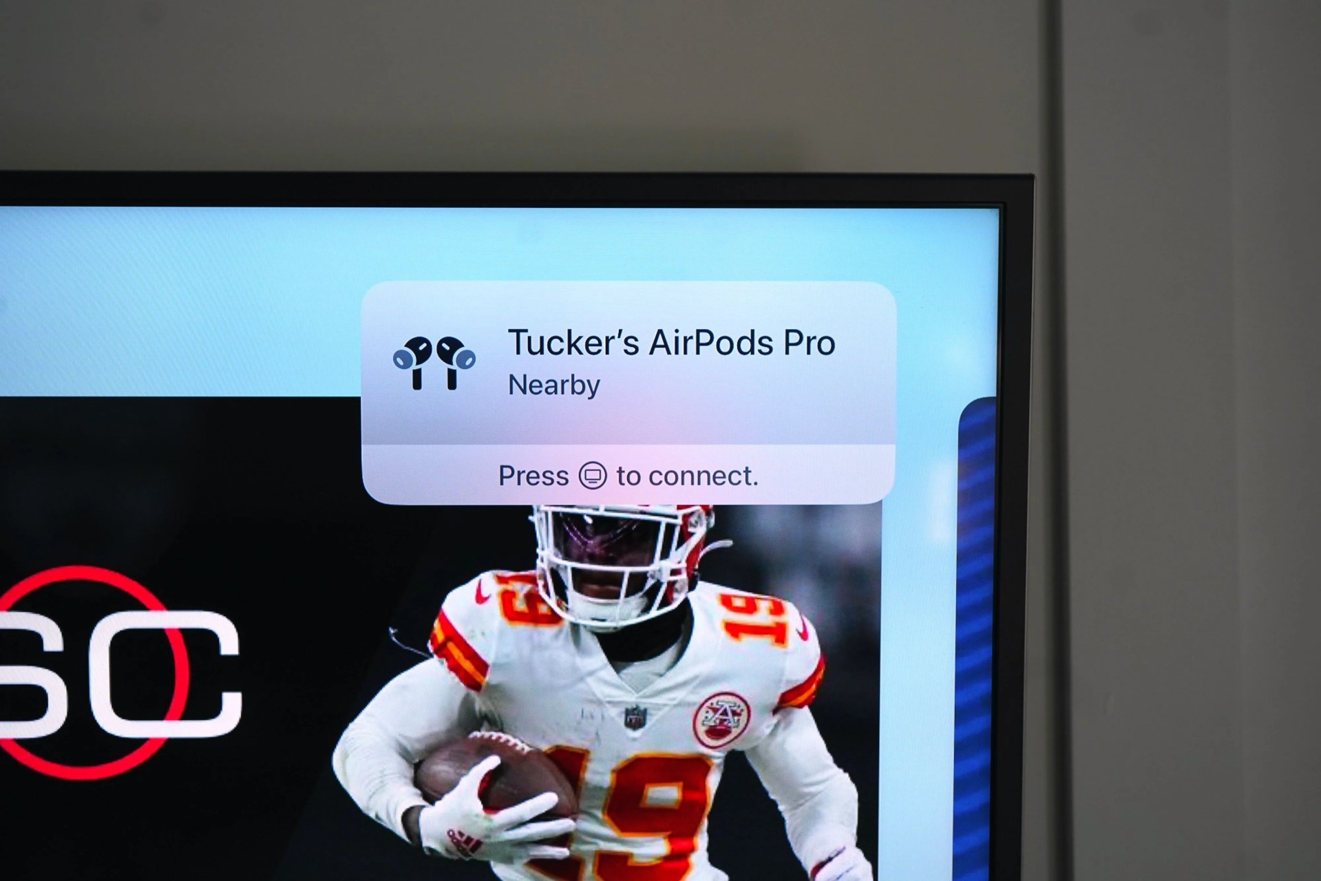 how to listen to airpods on apple tv