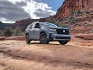 honda pilot trailsport parked on a desert rock ledge
