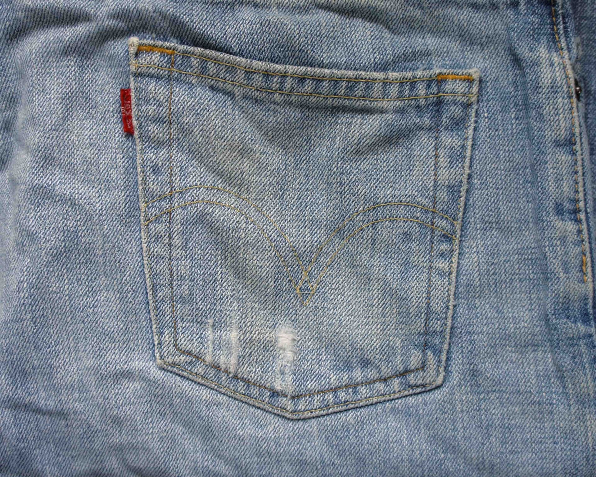 photo of a pocket on pair of blue jeans