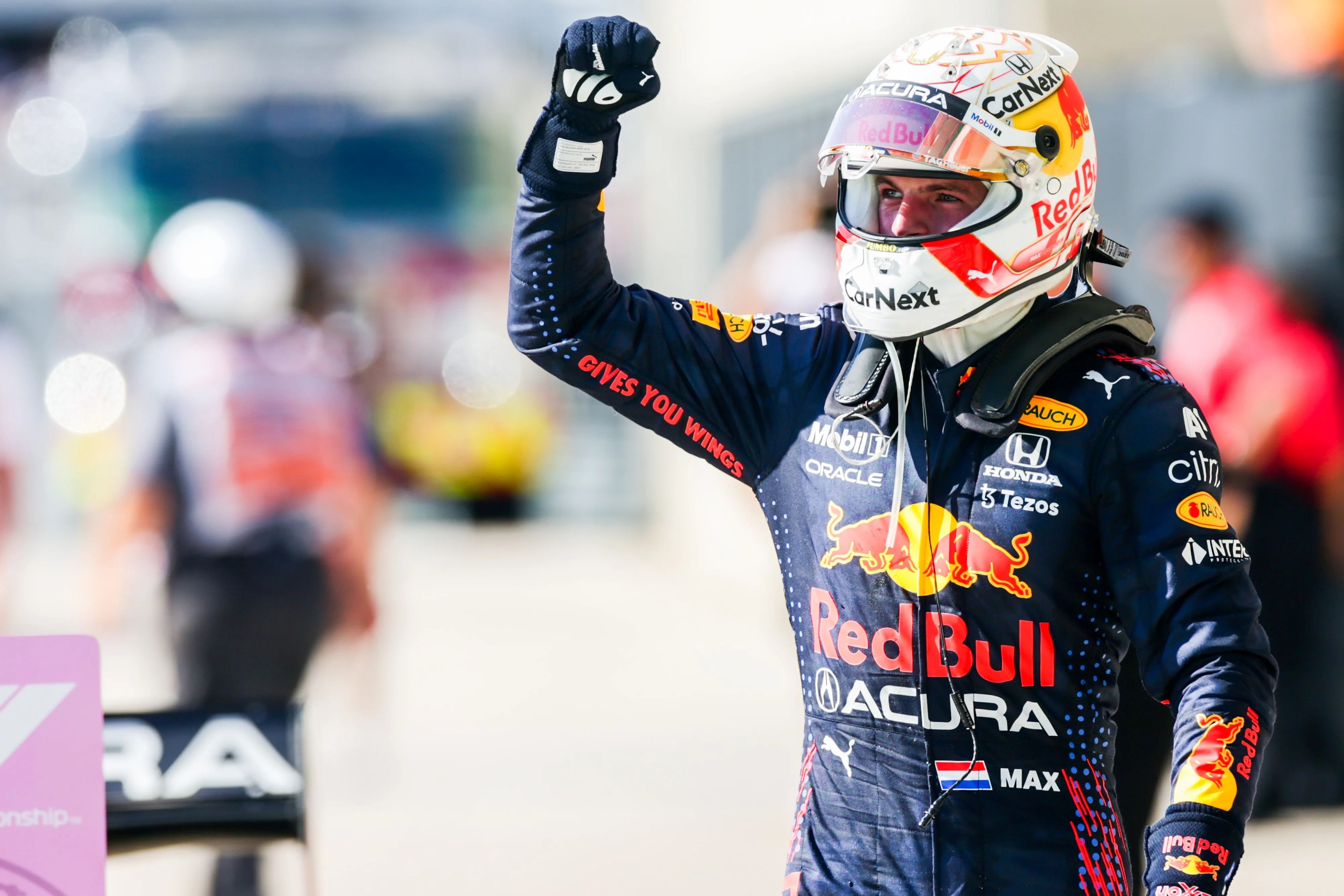 max verstappen raising fist in celebration at us grand prix