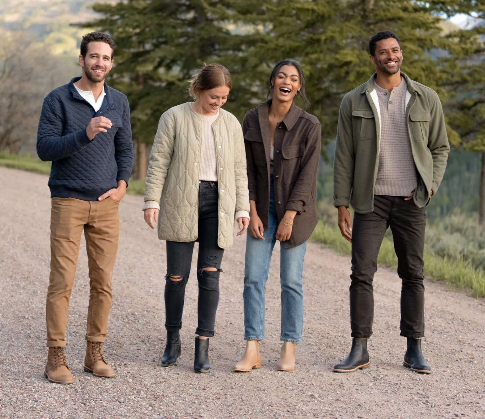 four people standing outside