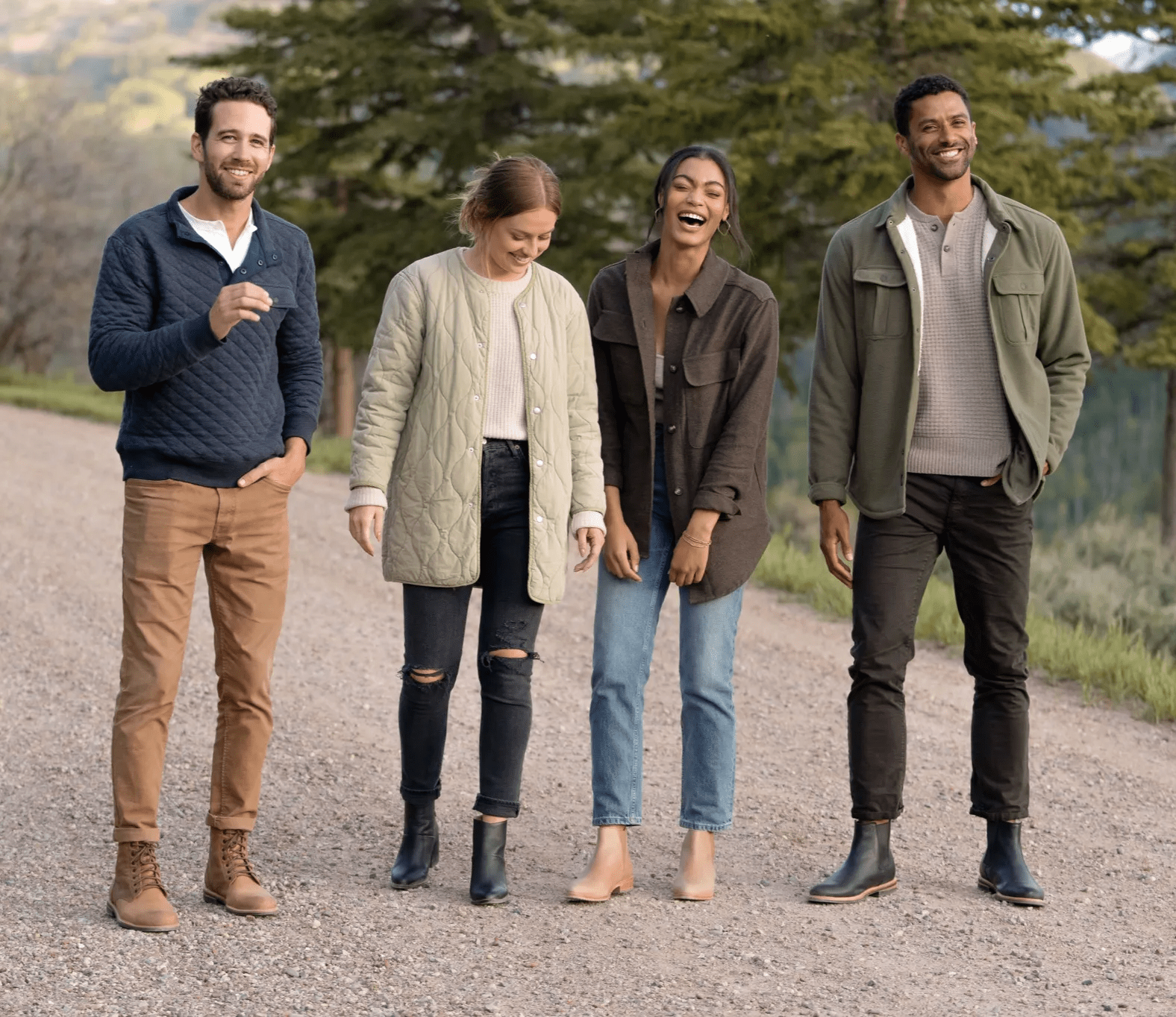 four people standing outside