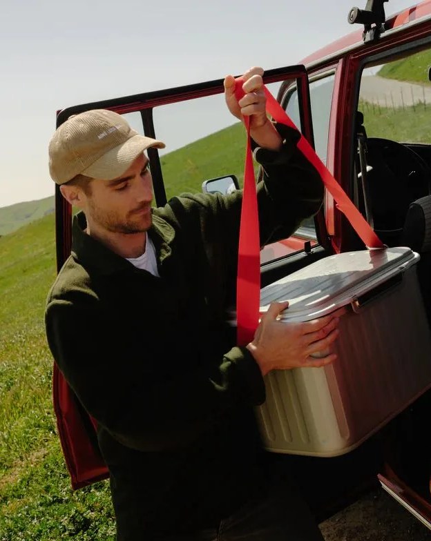man holding oyster 1st edition tempo cooler