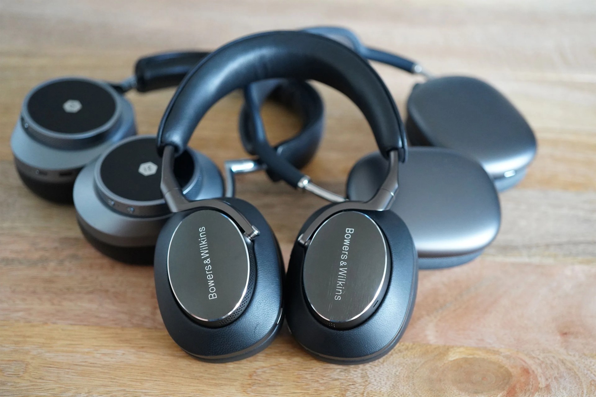 expensive noise-canceling headphones group photo