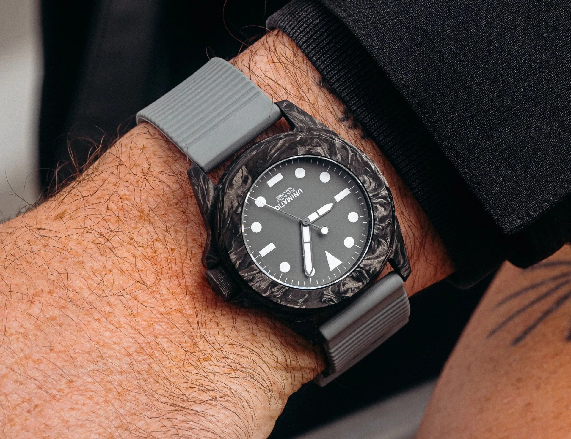 carbon watch worn on a wrist
