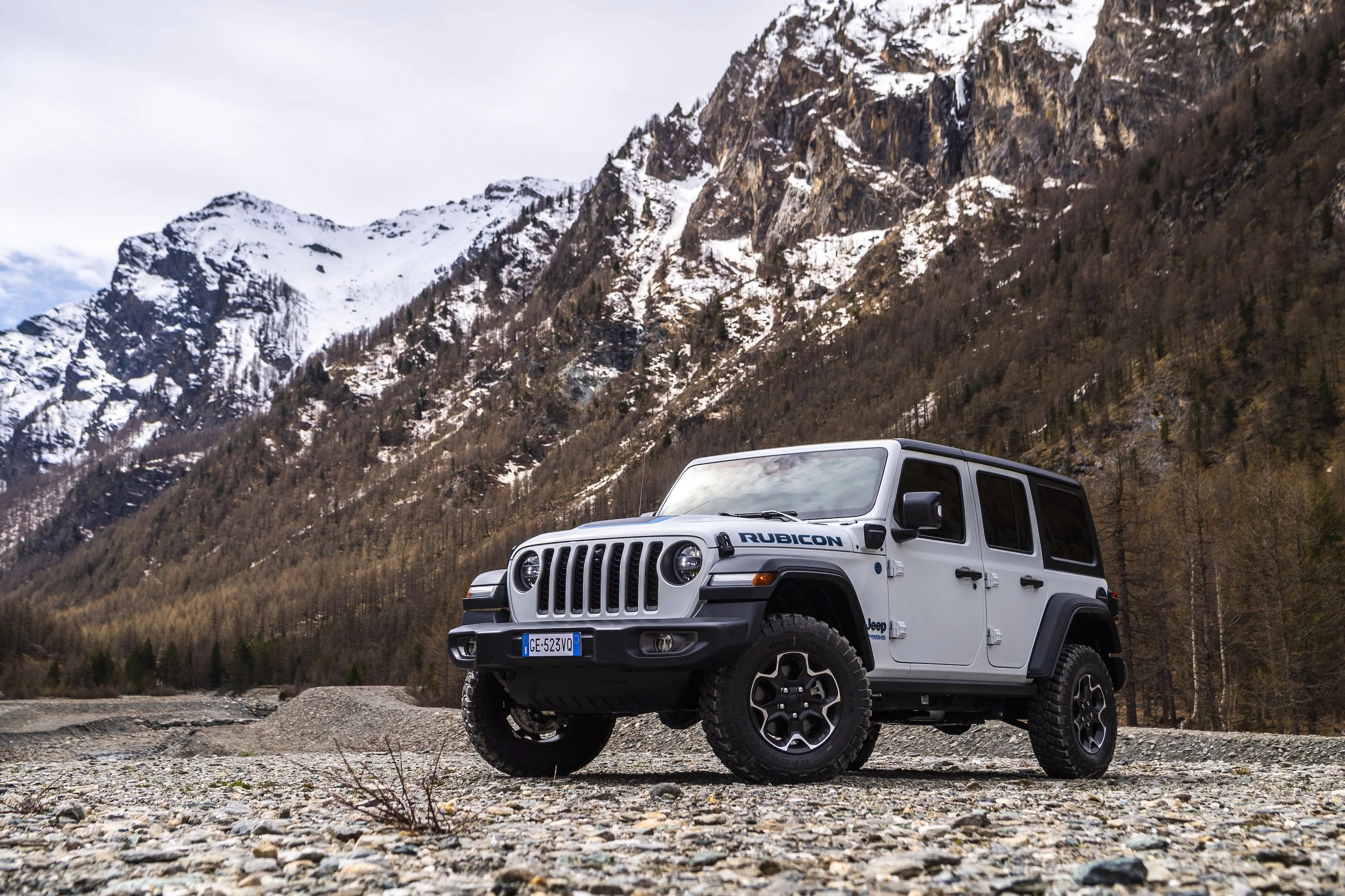 wrangler rubicon 4xe parked in front of mountains