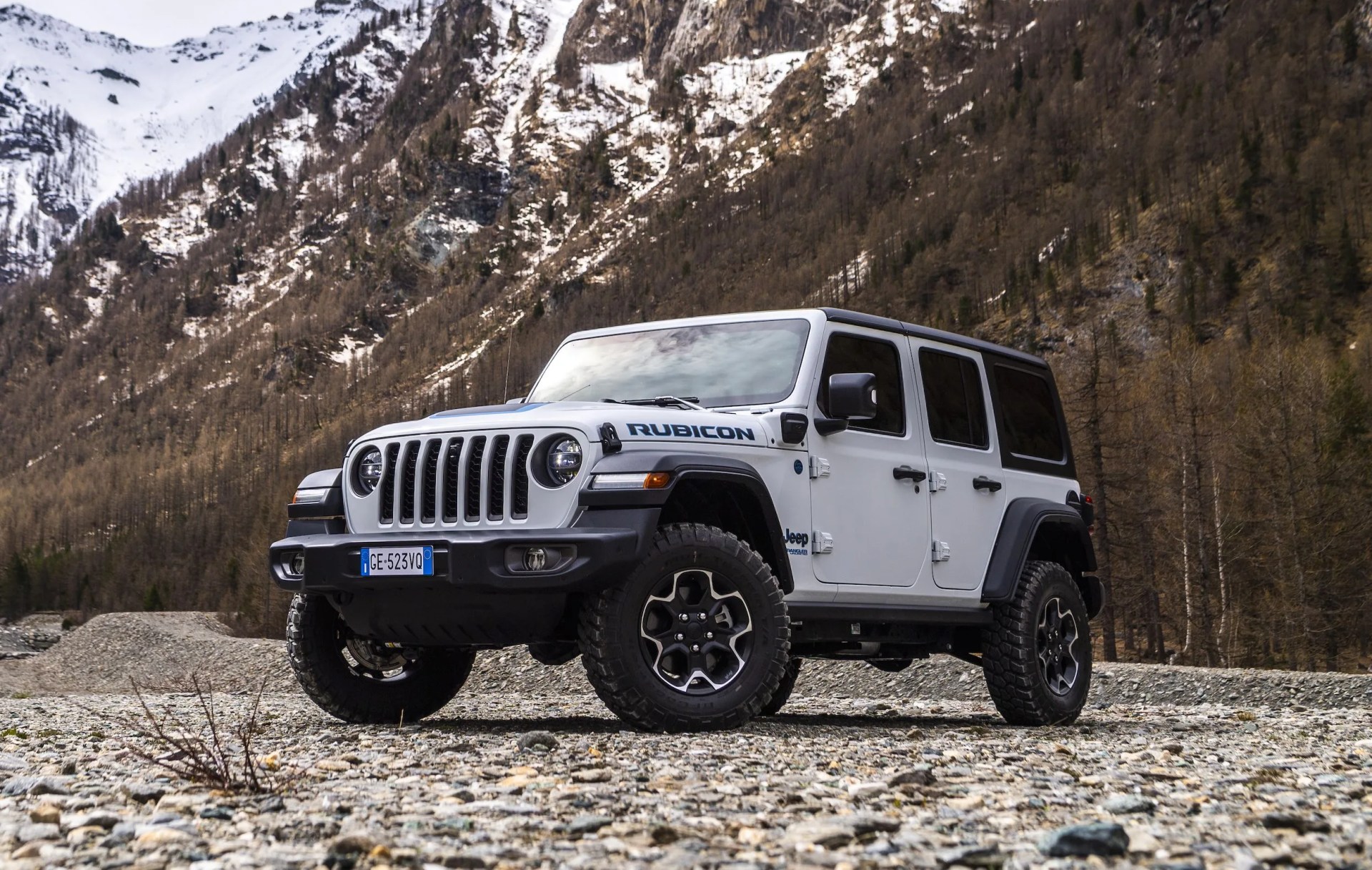 wrangler rubicon 4xe parked in front of mountains