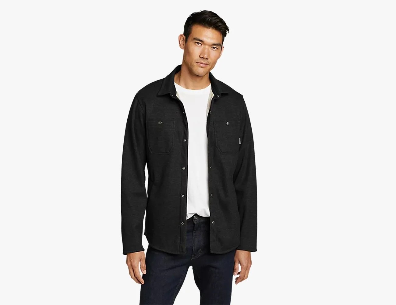 a man wearing a light jacket