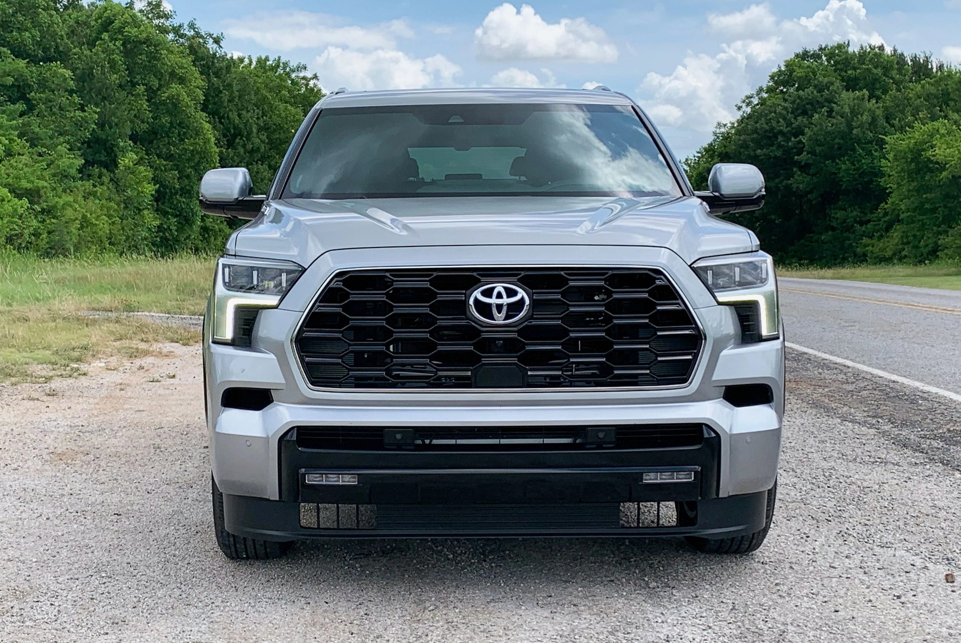 2023 silver toyota sequoia front on side of the road