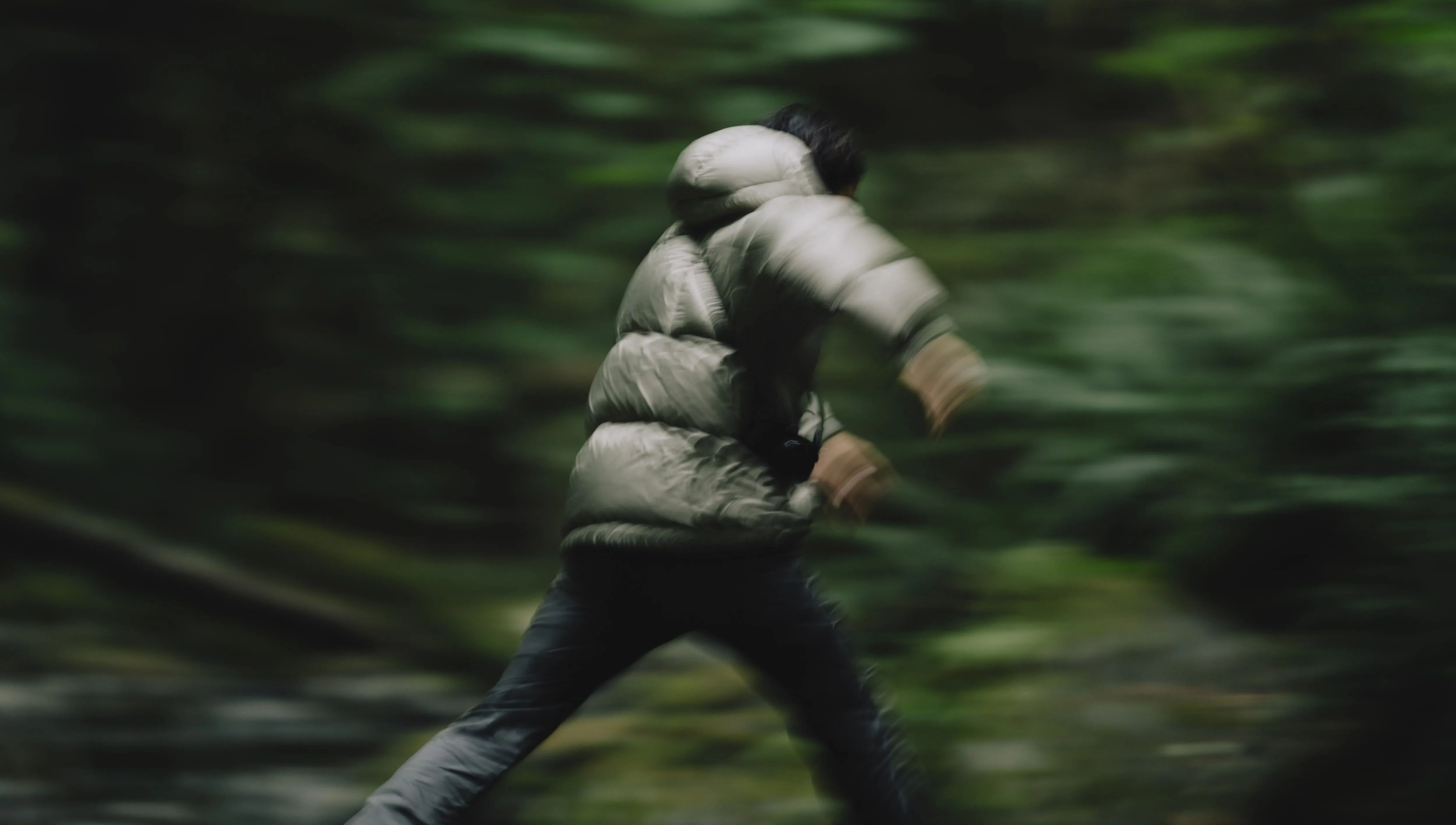 angel rodriguez running around vancouver island wearing a goldwin parka