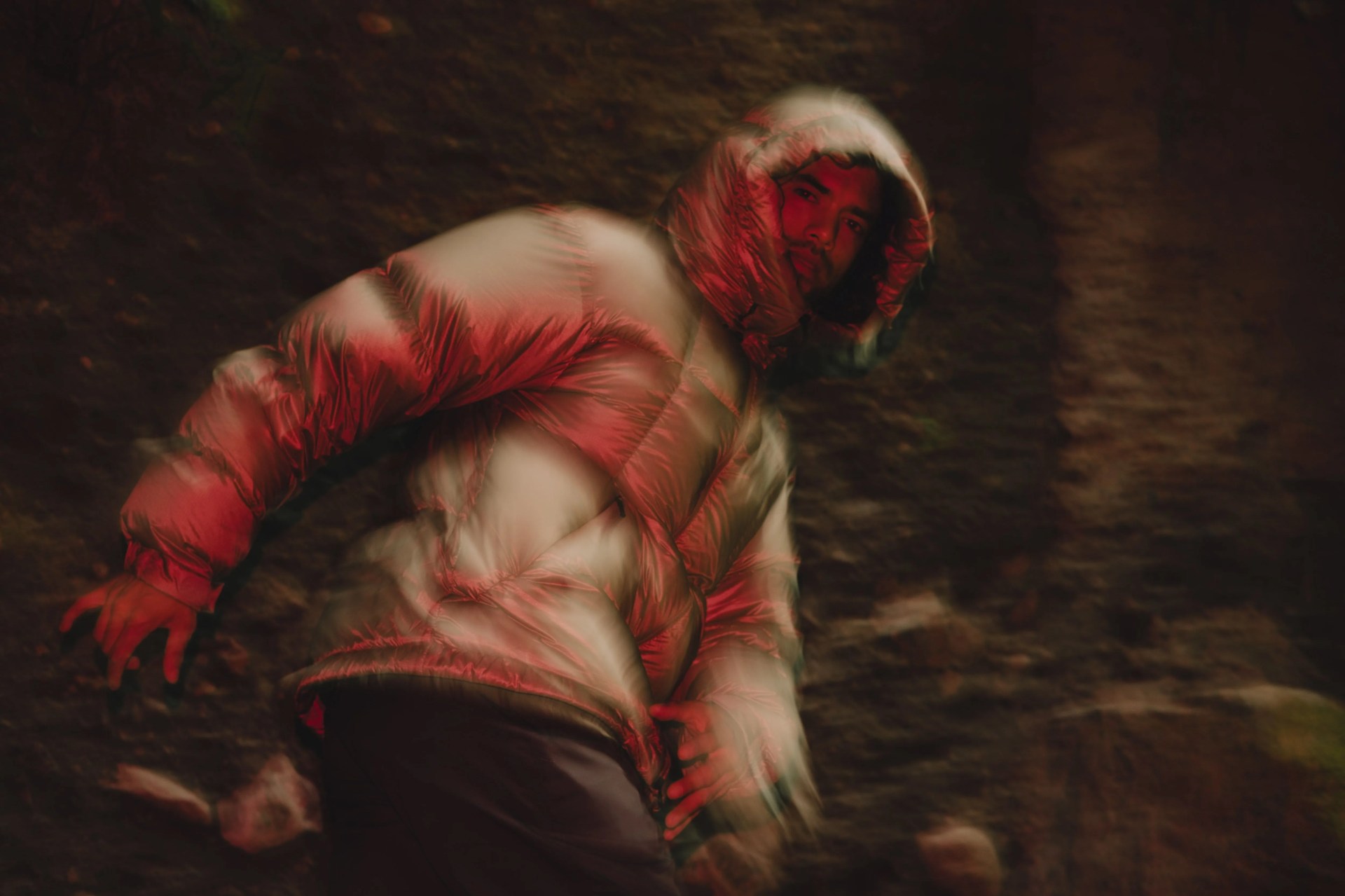 angel rodriguez running around vancouver island wearing a goldwin parka at night