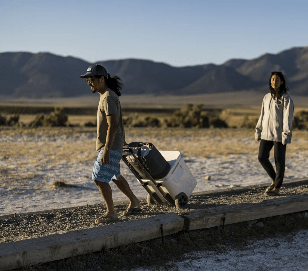 couple rolling yeti cooler