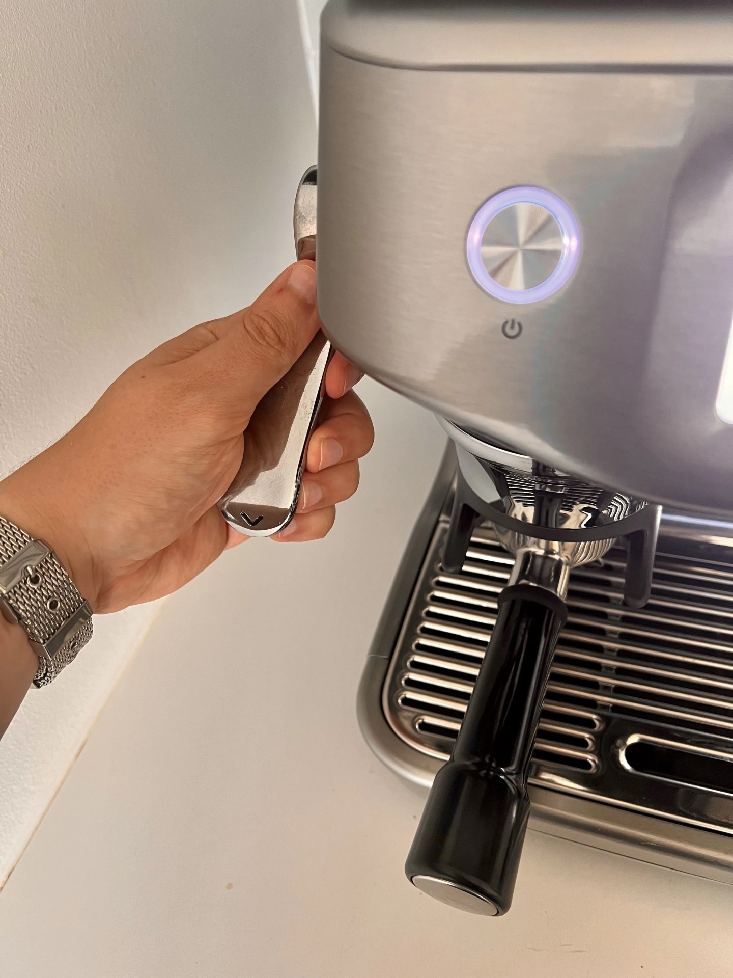 using the tamping lever on a breville espresso machine