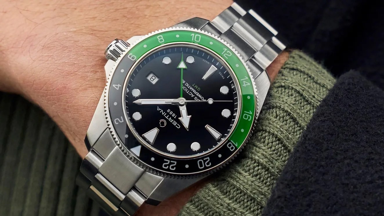 certina watch on mans wrist