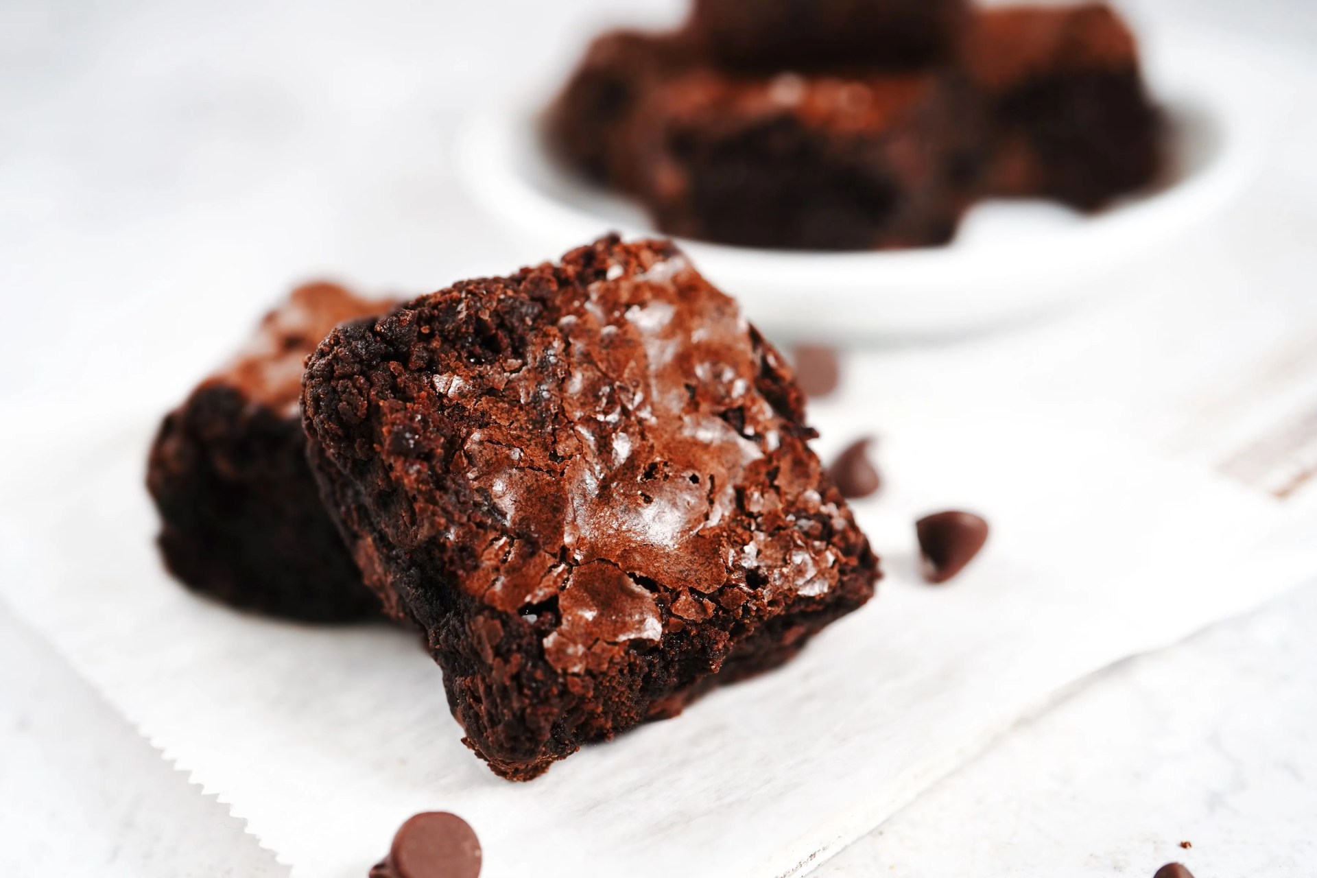 homemade classic crinkle top fudge brownies, selective focus