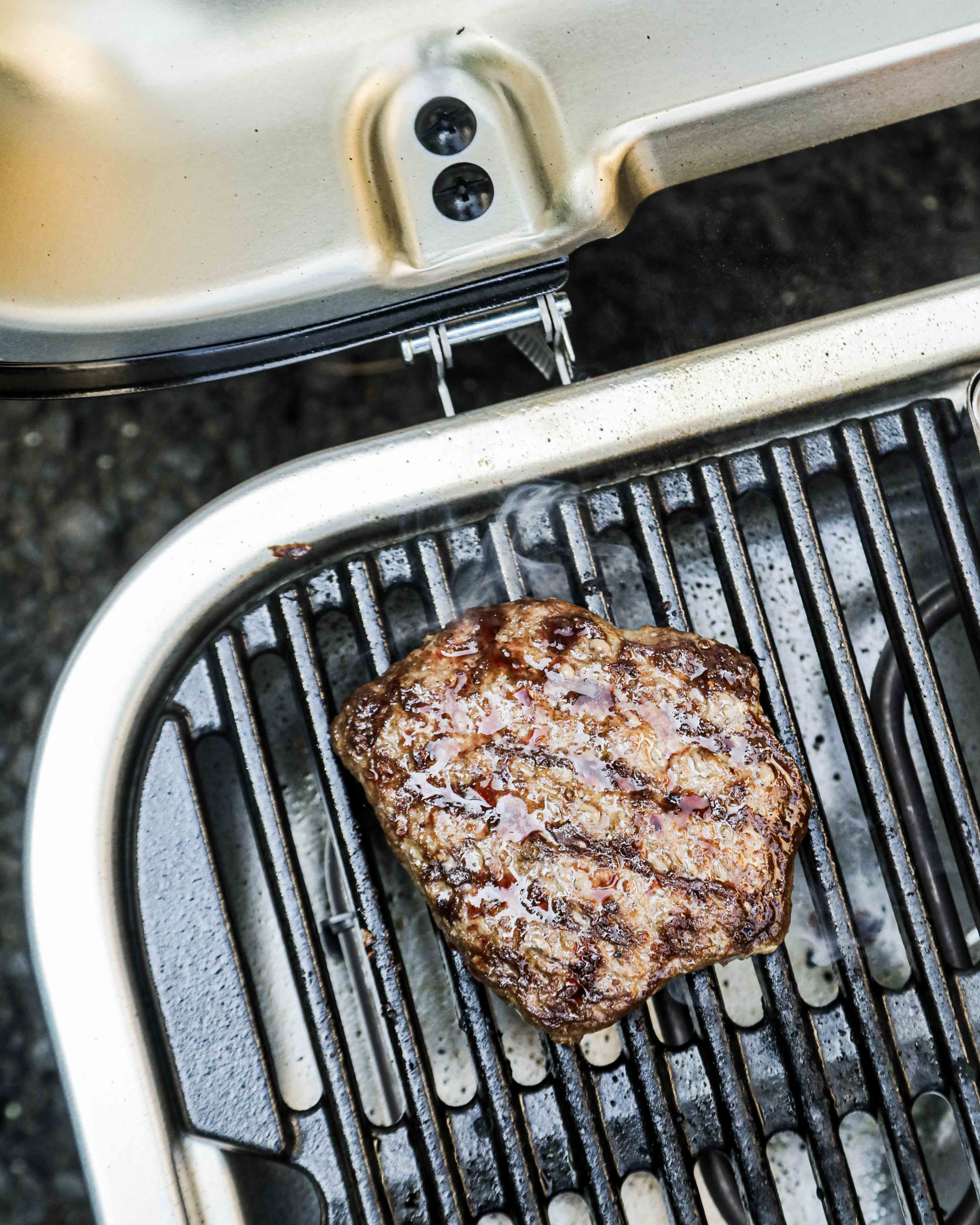 cooked burger on an electric grill top