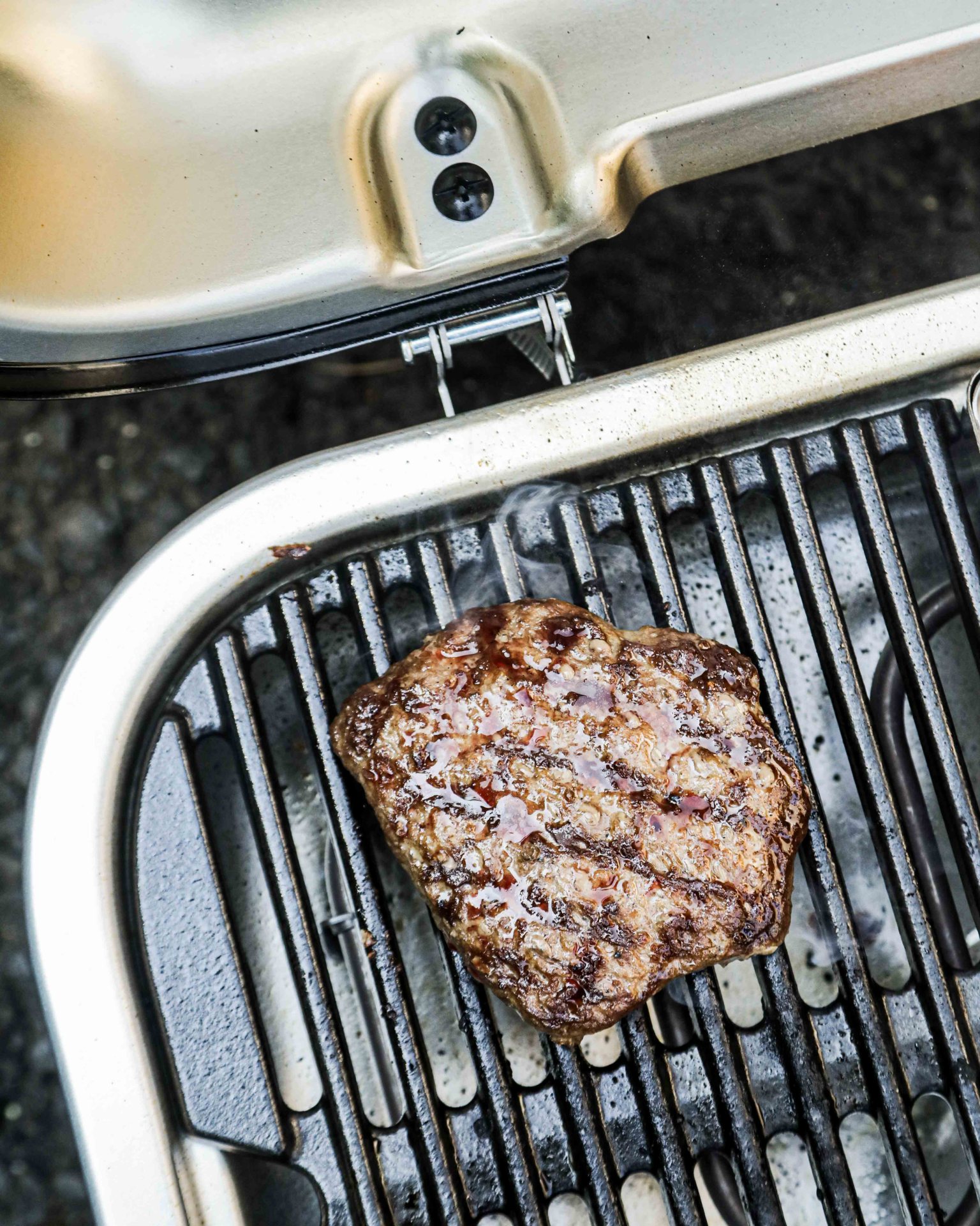 cooked burger on an electric grill top