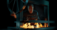 man grilling with kalamazoo gaucho grill