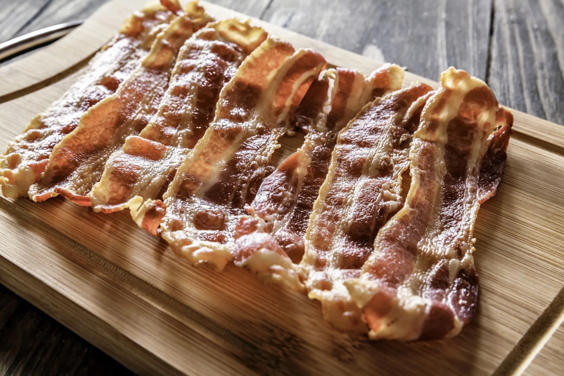 roasted bacon on cutting board