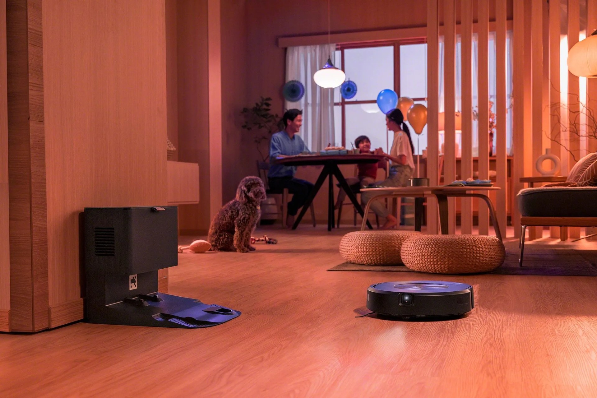 a roomba vacuum cleaner heading towards its docking station