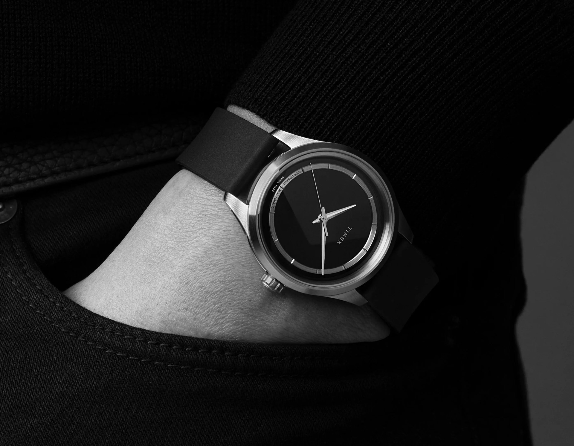 hand in pocket wearing wristwatch