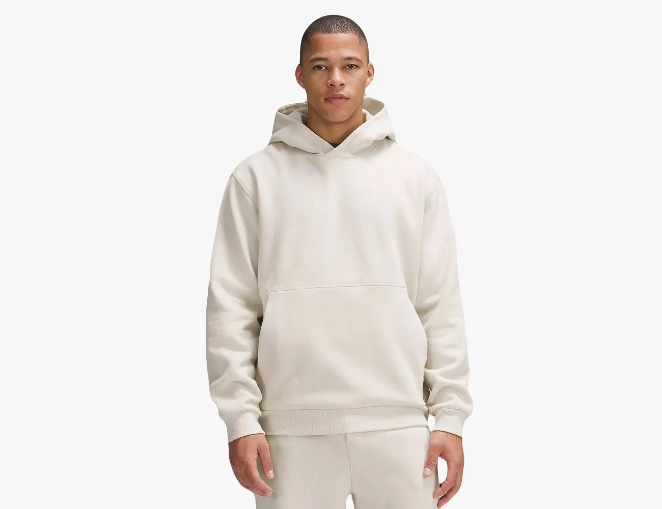 a person wearing a sweatsuit