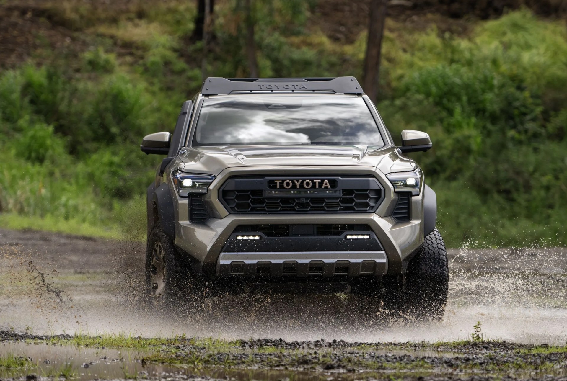 tacoma trailhunter driving through mud
