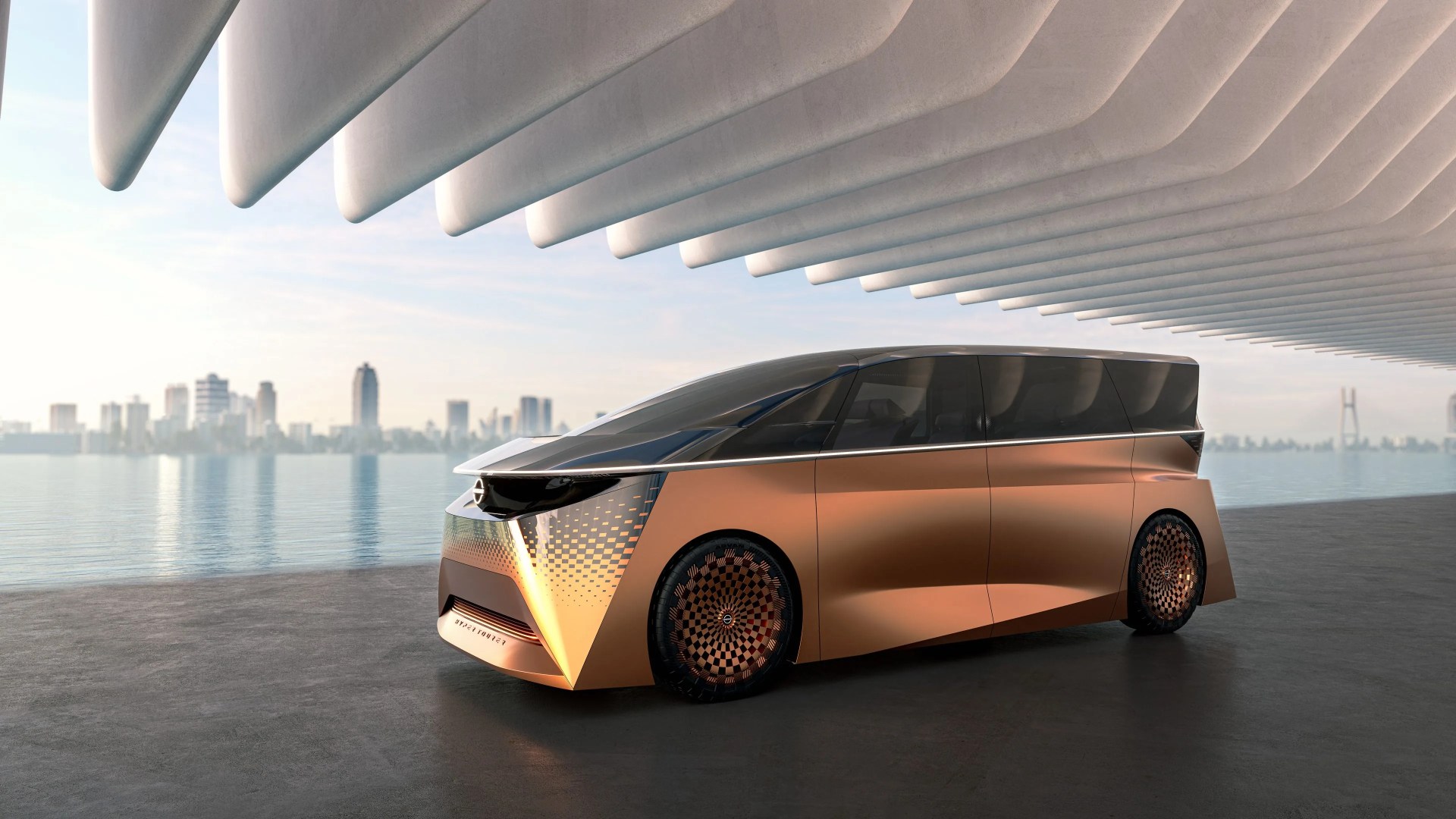 a futuristic van parked on a road