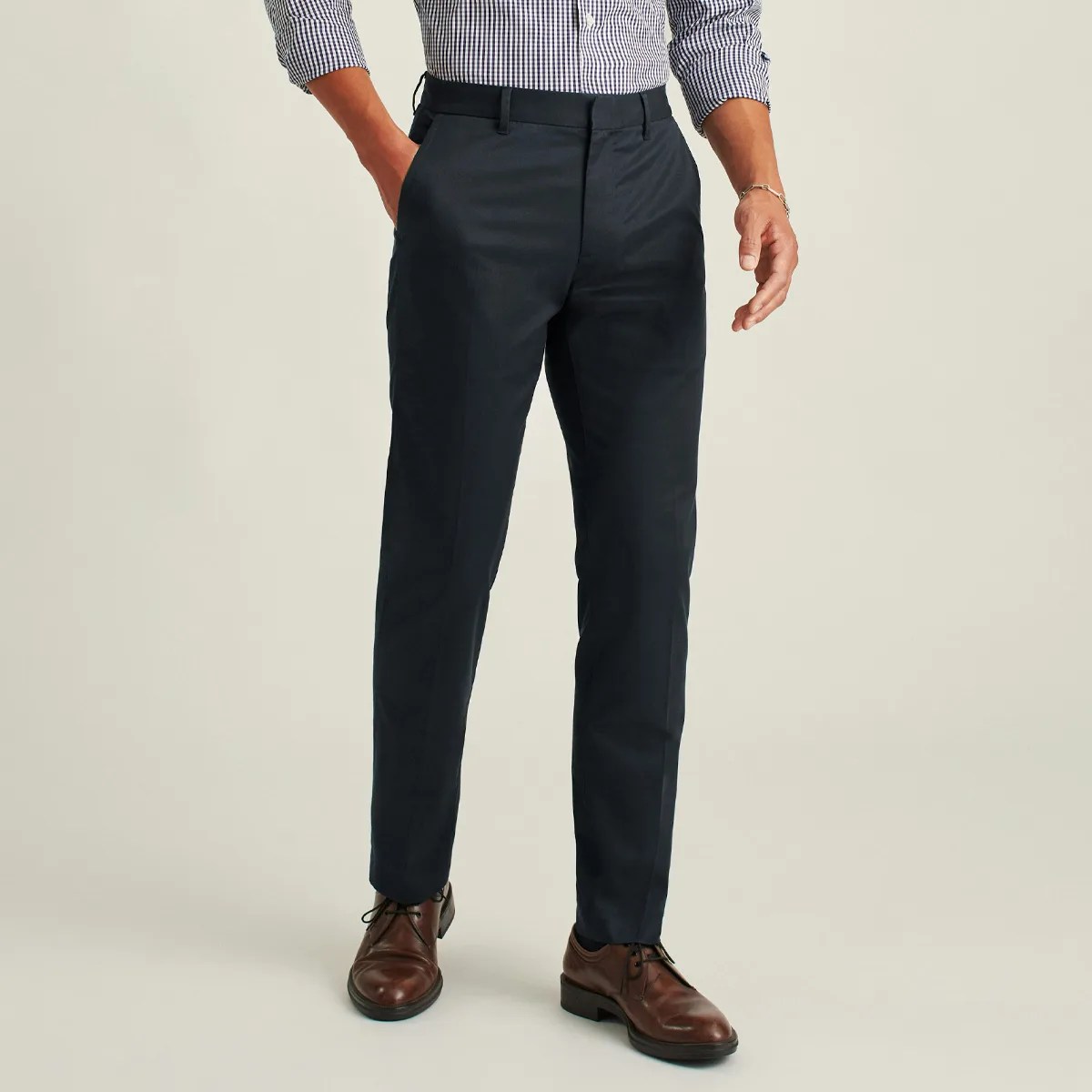 Bonobos weekday warrior pants being worn by model on grey background