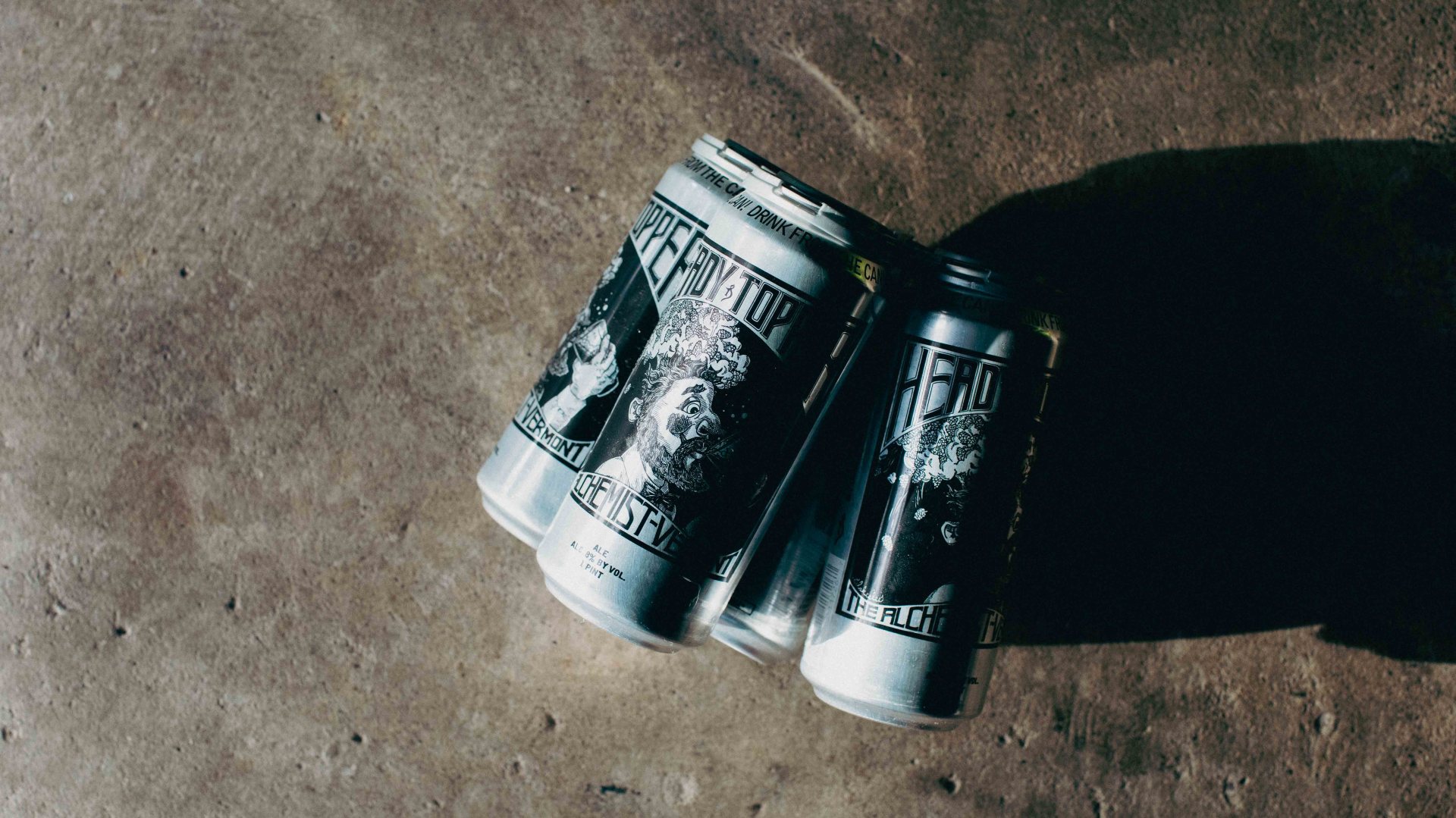 four-pack of heady topper beer with a moody background
