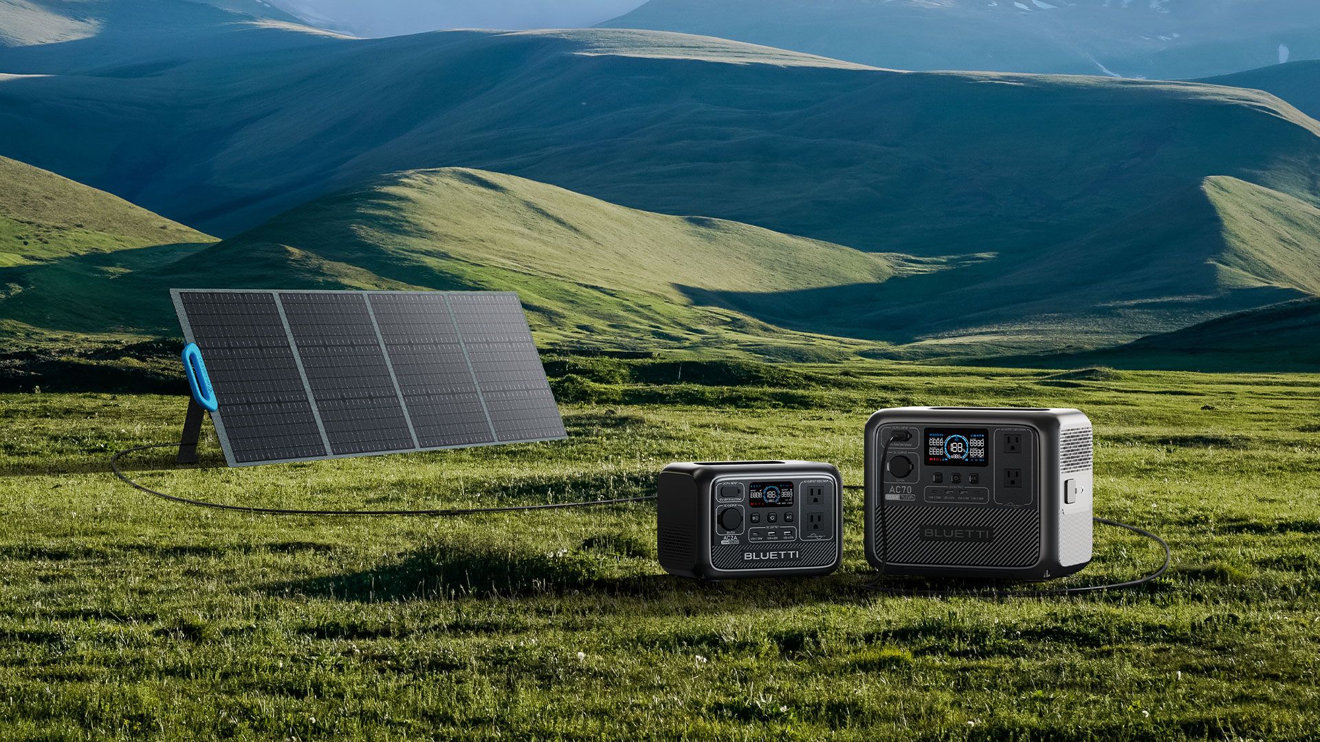 a solar panel on a grassy hill with bluetti portable power stations