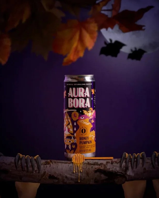 a can of aura bora honey pumpkin seltzer on a table