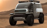 a toyota suv concept driving on a sandy road