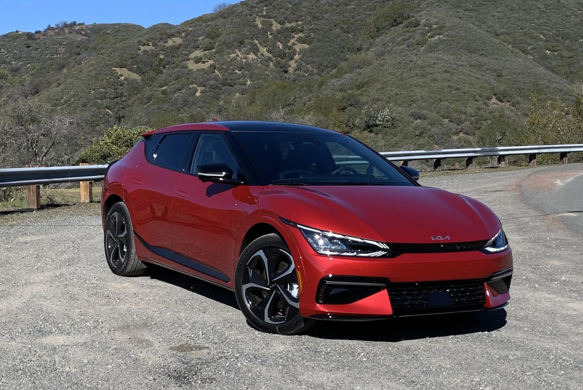 a red car parked on a road