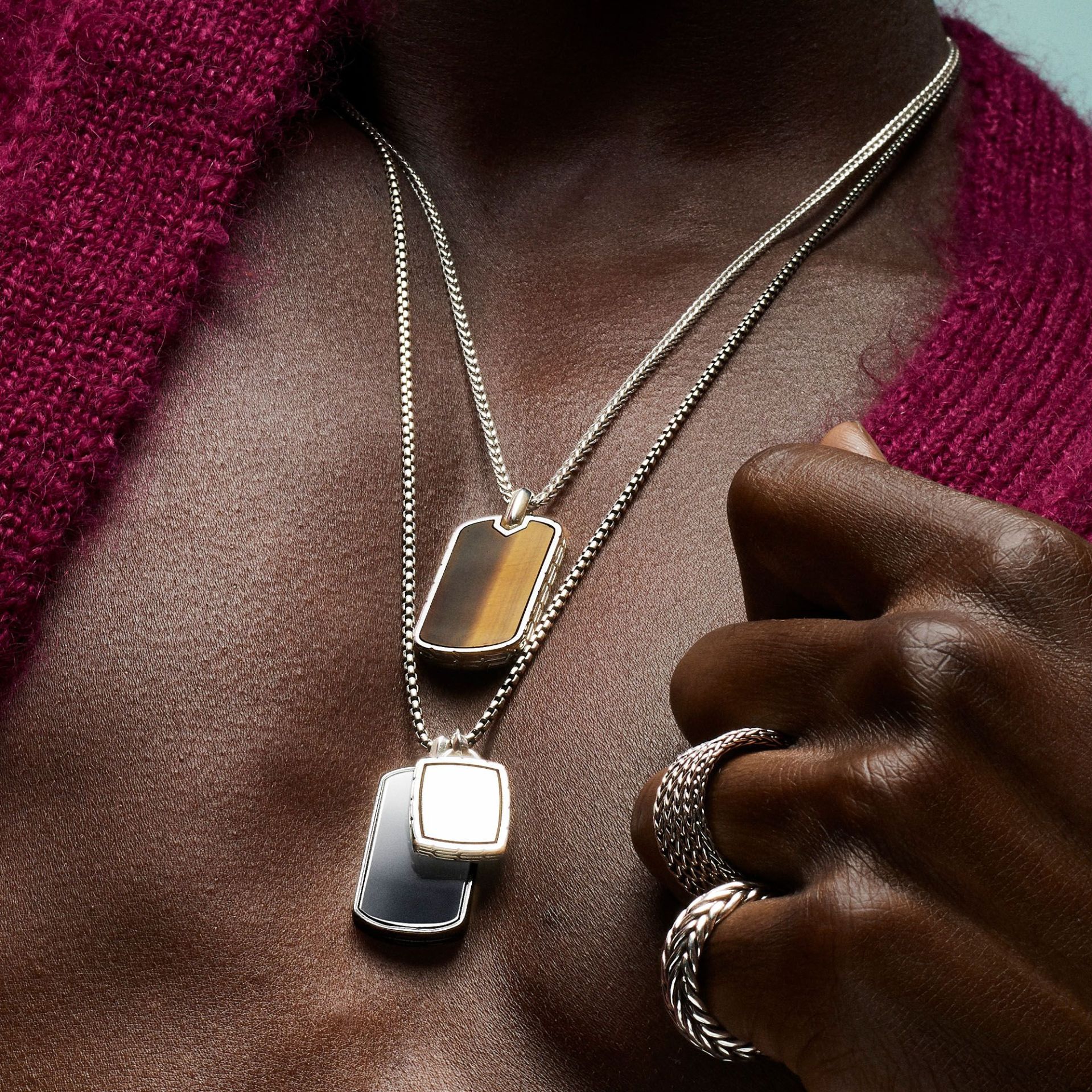 man wearing john hardy jewelry