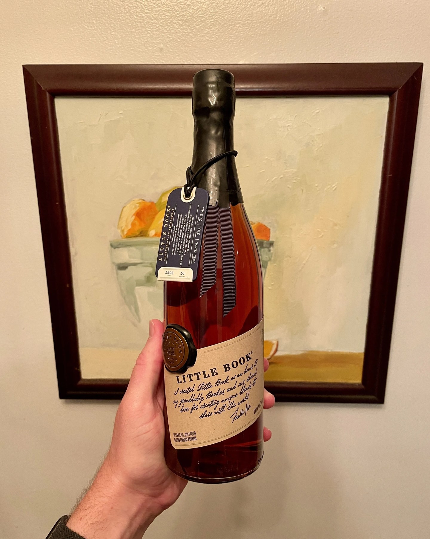 whiskey bottle in hand