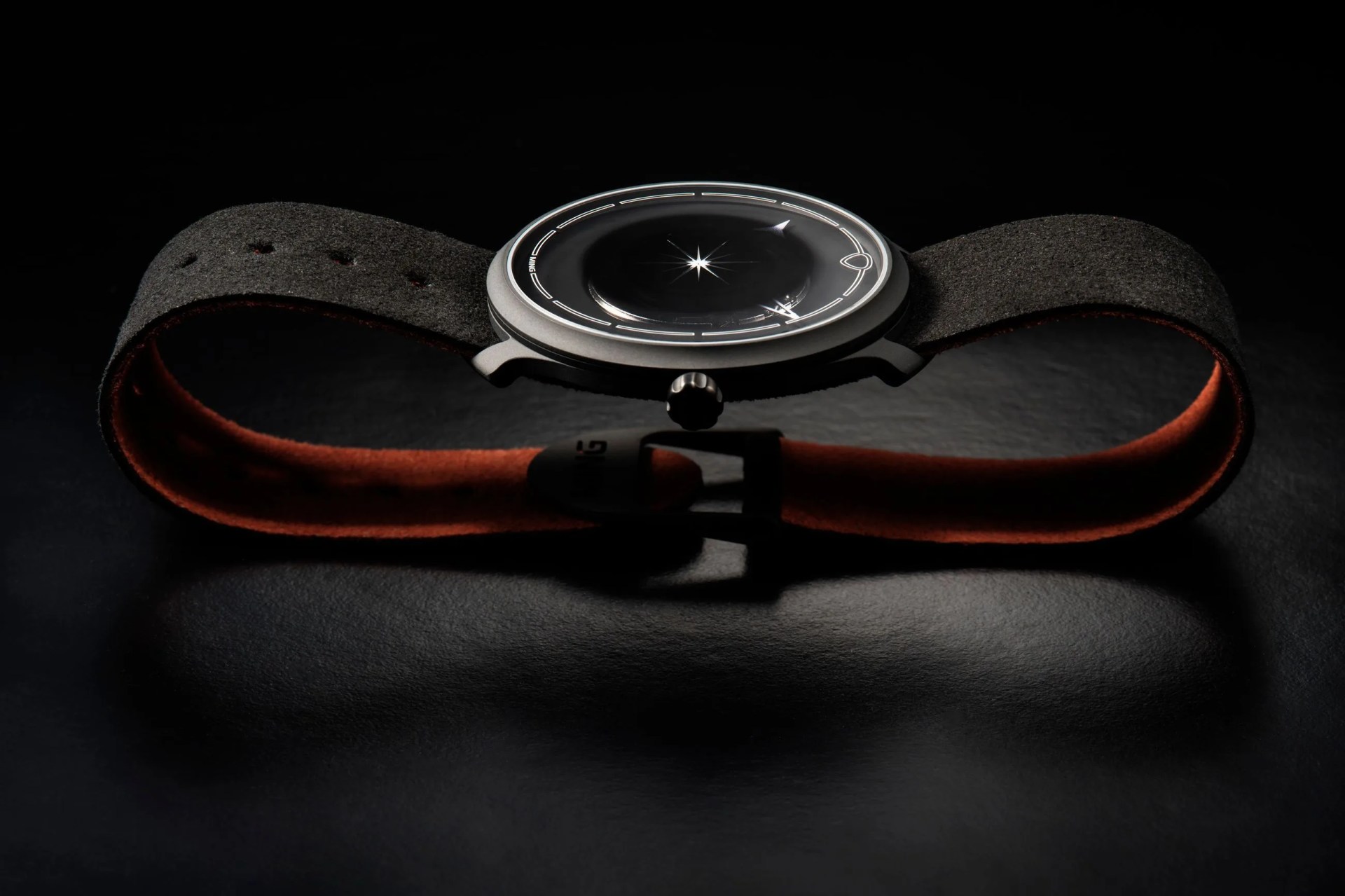 a watch on a surface