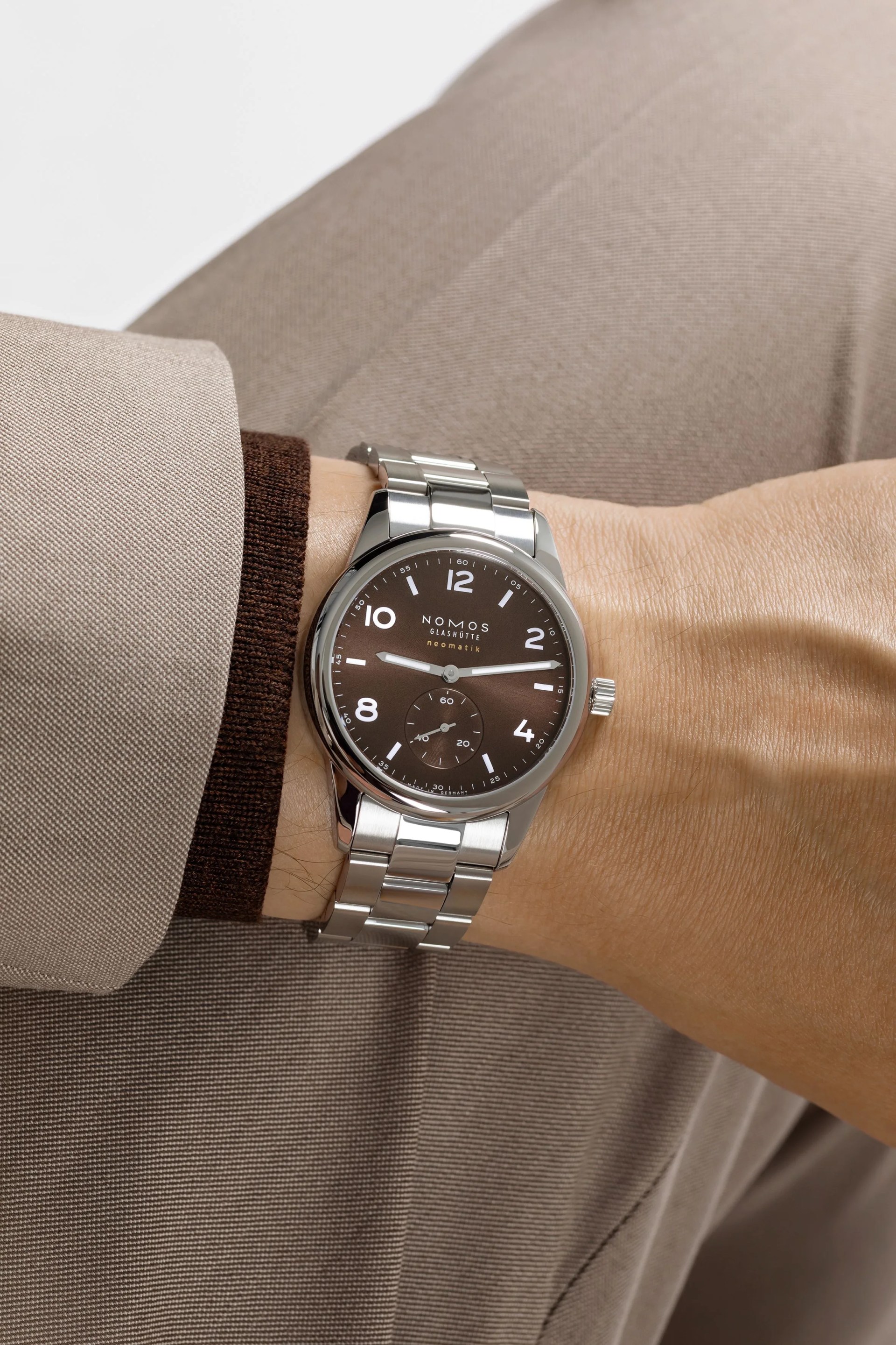 club sport neomatik 39 tabac watch worn on wrist