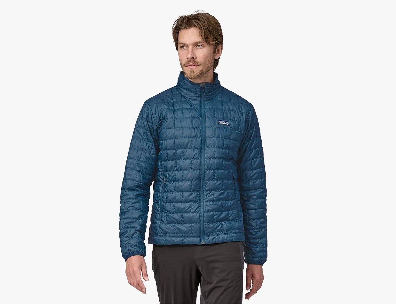 a man wearing a blue jacket