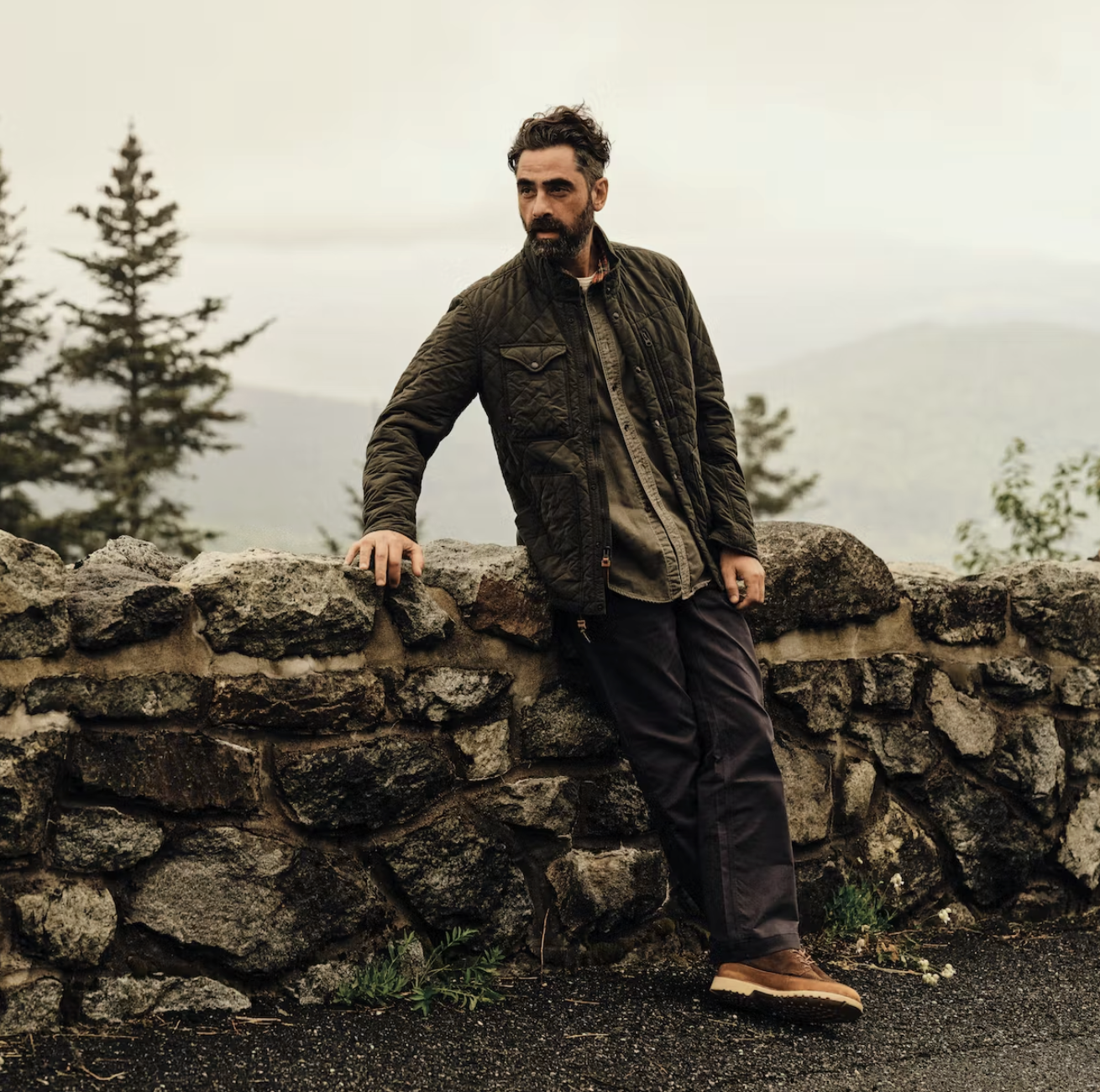 a man standing on a rock
